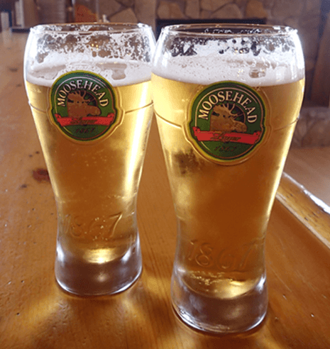 Enjoy Moosehead Beer on tap at the Watering Hole Bar inside Budd's Gunisao Lake Lodge home of The World's Best Trophy Walleye and Northern Pike Fishing located in Manitoba, Canada