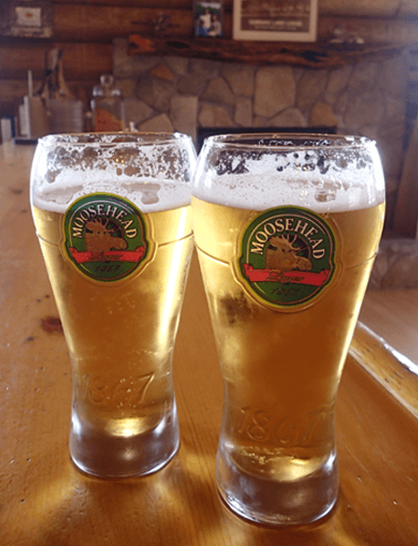 mooseheads-bar Enjoy Moosehead Beer on tap at the Watering Hole Bar inside Budd's Gunisao Lake Lodge home of The World's Best Trophy Walleye and Northern Pike Fishing located in Manitoba, Canada