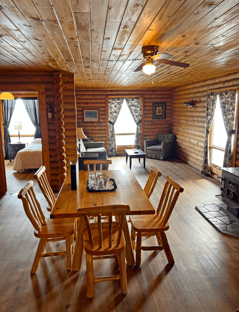 inside Big Log Cabin living room at Budd's Gunisao Lake Lodge World's Best Trophy Walleye and Northern Pike Fishing