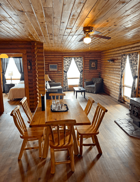 inside-big-log-cabin inside Big Log Cabin living room at Budd's Gunisao Lake Lodge World's Best Trophy Walleye and Northern Pike Fishing